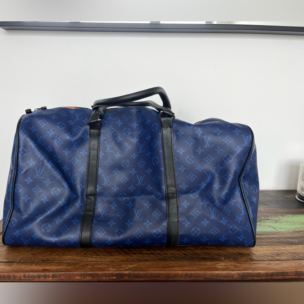 LV Blue Duffle Bag